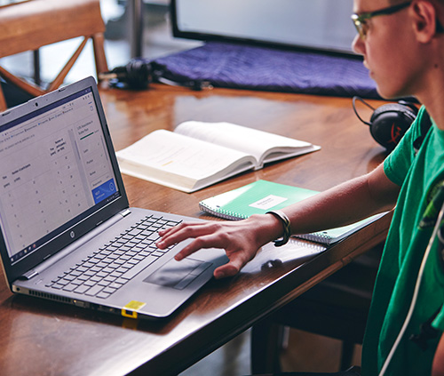 boy studying in the computer